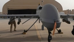 In this image provided by the US military, General Atomics liaisons load Hellfire missiles on an MQ-1C Gray Eagle on February 27, 2011 at Camp Taji, Iraq.