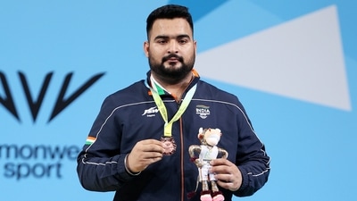 Weightlifter Lovepreet Singh poses for a photo after winning the bronze medal in men's weightlifting 109 Kg at the Commonwealth Games 2022 (Team India Twitter) Weightlifter Lovepreet Singh poses for a photo after winning the bronze medal in men's weightlifting 109 Kg at the Commonwealth Games 2022 (Team India Twitter)