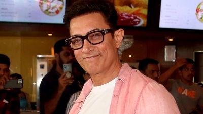 Aamir Khan poses for pictures during a promotional event for his upcoming movie Laal Singh Chaddha, in Mumbai, May 28, 2022. (PTI Photo) (PTI)