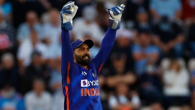 India's Dinesh Karthik celebrates taking a catch (Reuters)