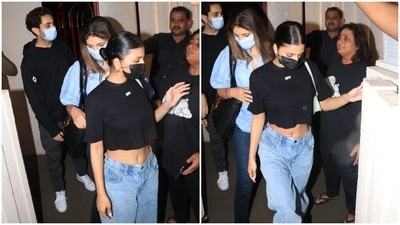 Suhana chose a date-night-ready ensemble for the outing. Her fit is from the shelves of the luxury clothing label Off-White and features a black crop top with drop shoulder detail, round neckline, half sleeves, loose silhouette, and a cropped hem length exposing the midriff. (HT Photo/Varinder Chawla) Suhana chose a date-night-ready ensemble for the outing. Her fit is from the shelves of the luxury clothing label Off-White and features a black crop top with drop shoulder detail, round neckline, half sleeves, loose silhouette, and a cropped hem length exposing the midriff. (HT Photo/Varinder Chawla)