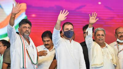 KPCC president DK Shivakumar, Congress leader Rahul Gandhi and former Karnataka CM Siddaramaiah, during the latter's 75th birthday celebrations, in Davangere on Wednesday. (PTI) KPCC president DK Shivakumar, Congress leader Rahul Gandhi and former Karnataka CM Siddaramaiah, during the latter's 75th birthday celebrations, in Davangere on Wednesday. (PTI)