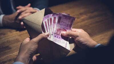 An architect of the Haryana State Agricultural Marketing Board was arrested for allegedly accepting a bribe of  ₹1.5 lakh. (Getty Images/iStockphoto)