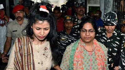 Accused IAS officer Pooja Singhal being brought to the ED court in connection with a money laundering case linked to alleged embezzlement of MGNREGA funds in Khunti district, in Ranchi on Friday. (ANI) Accused IAS officer Pooja Singhal being brought to the ED court in connection with a money laundering case linked to alleged embezzlement of MGNREGA funds in Khunti district, in Ranchi on Friday. (ANI)