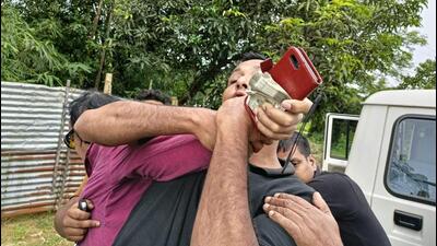 A video of the forest officer’s arrest in Assam has now gone viral on social media. (Twitter/GP Singh) A video of the forest officer’s arrest in Assam has now gone viral on social media. (Twitter/GP Singh)