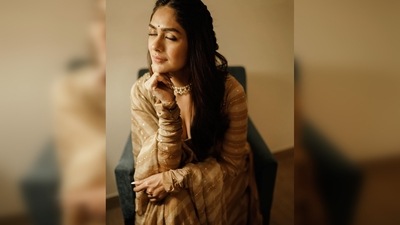Mrunal Thakur half braided her long luscious tresses and left the rest open with soft beachy waves. She kept her makeup minimal to make her outfit stand out. (Instagram/@mrunalthakur) Mrunal Thakur half braided her long luscious tresses and left the rest open with soft beachy waves. She kept her makeup minimal to make her outfit stand out. (Instagram/@mrunalthakur)