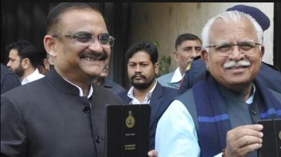 TVSN Prasad (left) with Haryana chief minister Manohar Lal Khattar in Chandigarh. Prasad has been appointed additional chief secretary, home, following the retirement of Rajeev Arora. (HT file photo)