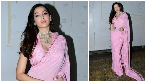 Nora Fatehi earlier wore a pink saree to the sets of Dance Deewane Juniors. She accessorised her look with a kundan layered choker.(HT Photo/Varinder Chawla)