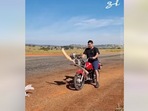 Taken from the Facebook viral video, the man is riding a motorcycle with a propeller.