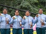 India's Lovely Choubey, Pinki, Nayanmoni Saikia and Rupa Rani Tirkey pose with their CWG 2022 gold medal(PTI)