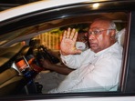Senior Congress leader Mallikarjun Kharge leaves Young Indian (YI) office, the holding company of Congress-owned newspaper National Herald, in New Delhi.