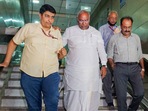 Senior Congress leader Mallikarjun Kharge leaves Young Indian (YI) office in New Delhi on Thursday.