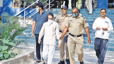 Accused Tukaram Supe (in white) at cyber police station in Pune. (Rahul Raut/HT Photo) Accused Tukaram Supe (in white) at cyber police station in Pune. (Rahul Raut/HT Photo)