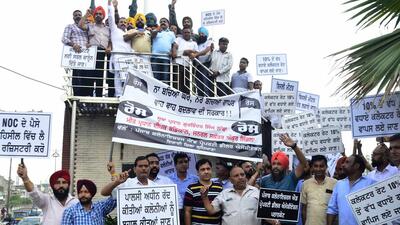 Punjab Colonisers and Property Dealers Association holding protest against the state government in Ludhiana. (Harvinder Singh/HT)