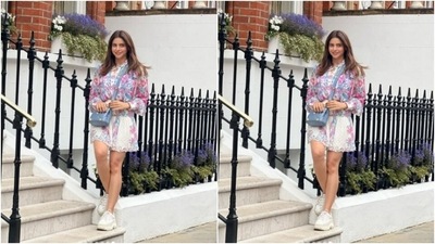 Aamna teamed her shirt with a white short skirt with elastic details at the waist and featuring floral patterns. (Instagram/@aamnasharifofficial)