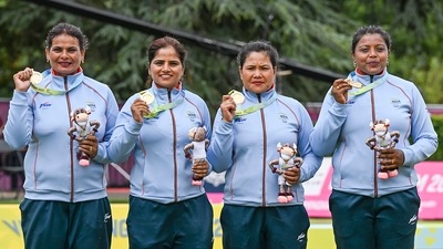 India's Lovely Choubey, Pinki, Nayanmoni Saikia and Rupa Rani Tirkey pose with their CWG 2022 gold medal (PTI)