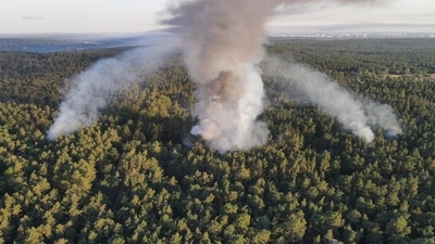 "Do not enter the woodland," the Berlin fire service warned in a tweet on Thursday morning as 15,000 square metres of forest in western Berlin was ignited due to explosions. (Berlin Fire Department) "Do not enter the woodland," the Berlin fire service warned in a tweet on Thursday morning as 15,000 square metres of forest in western Berlin was ignited due to explosions. (Berlin Fire Department)