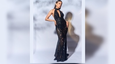 Rakul Preet's ensemble features a halter neck with a chest cut-out, a fully open back and a floor-sweeping trail. (Instagram/@stylebyami) Rakul Preet's ensemble features a halter neck with a chest cut-out, a fully open back and a floor-sweeping trail. (Instagram/@stylebyami)