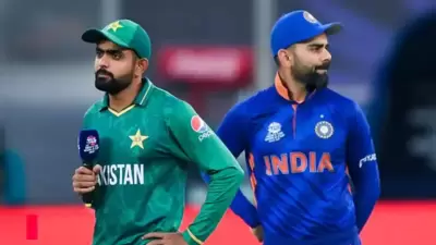 Babar Azam (L) and Virat Kohli (ICC) Babar Azam (L) and Virat Kohli (ICC)