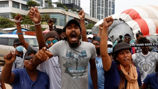 Anti-government demonstrators shout slogans against policemen giving notice to them to leave a seafront tent camp that became the focal point of months-long nationwide demonstrations, amid Sri Lanka's economic crisis, in Colombo, Sri Lanka, August 4, 2022.&nbsp;(REUTERS)