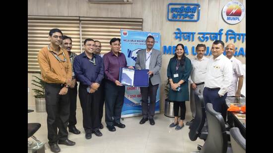 MUNPL and Indian bank officials after signing the agreement on Thursday. (HT PHOTO)