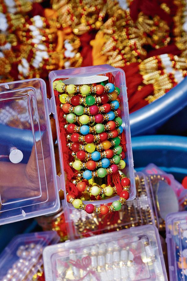 Floral rakhis and rakhis made out of colourful beads are a preferred choice this year. Price: ₹35 to ₹50. (Photo: Shantanu Bhattacharya/HT) Floral rakhis and rakhis made out of colourful beads are a preferred choice this year. Price: ₹35 to ₹50. (Photo: Shantanu Bhattacharya/HT)
