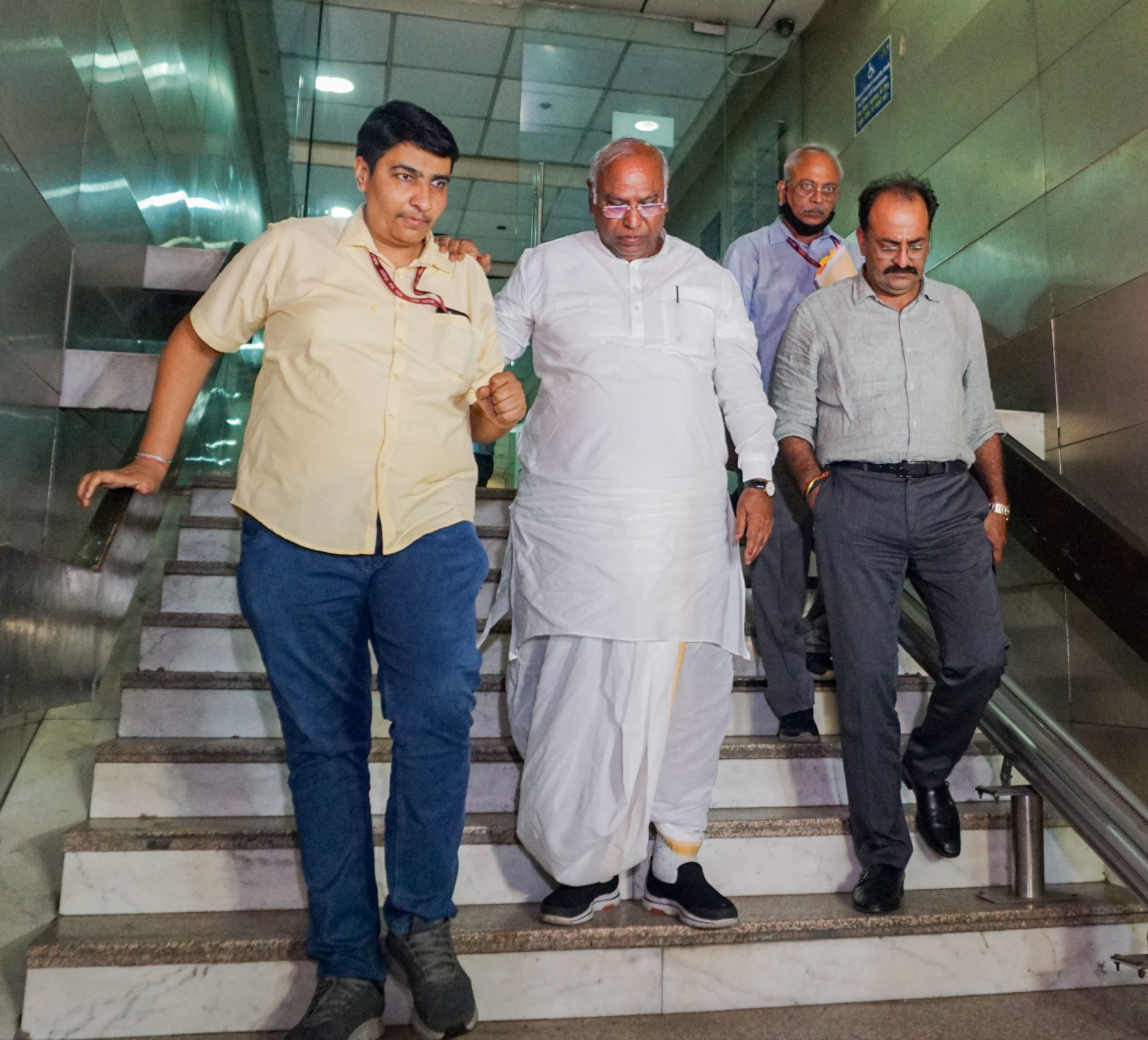 Senior Congress leader Mallikarjun Kharge leaves Young Indian (YI) office in New Delhi on Thursday. (PTI) Senior Congress leader Mallikarjun Kharge leaves Young Indian (YI) office in New Delhi on Thursday. (PTI)