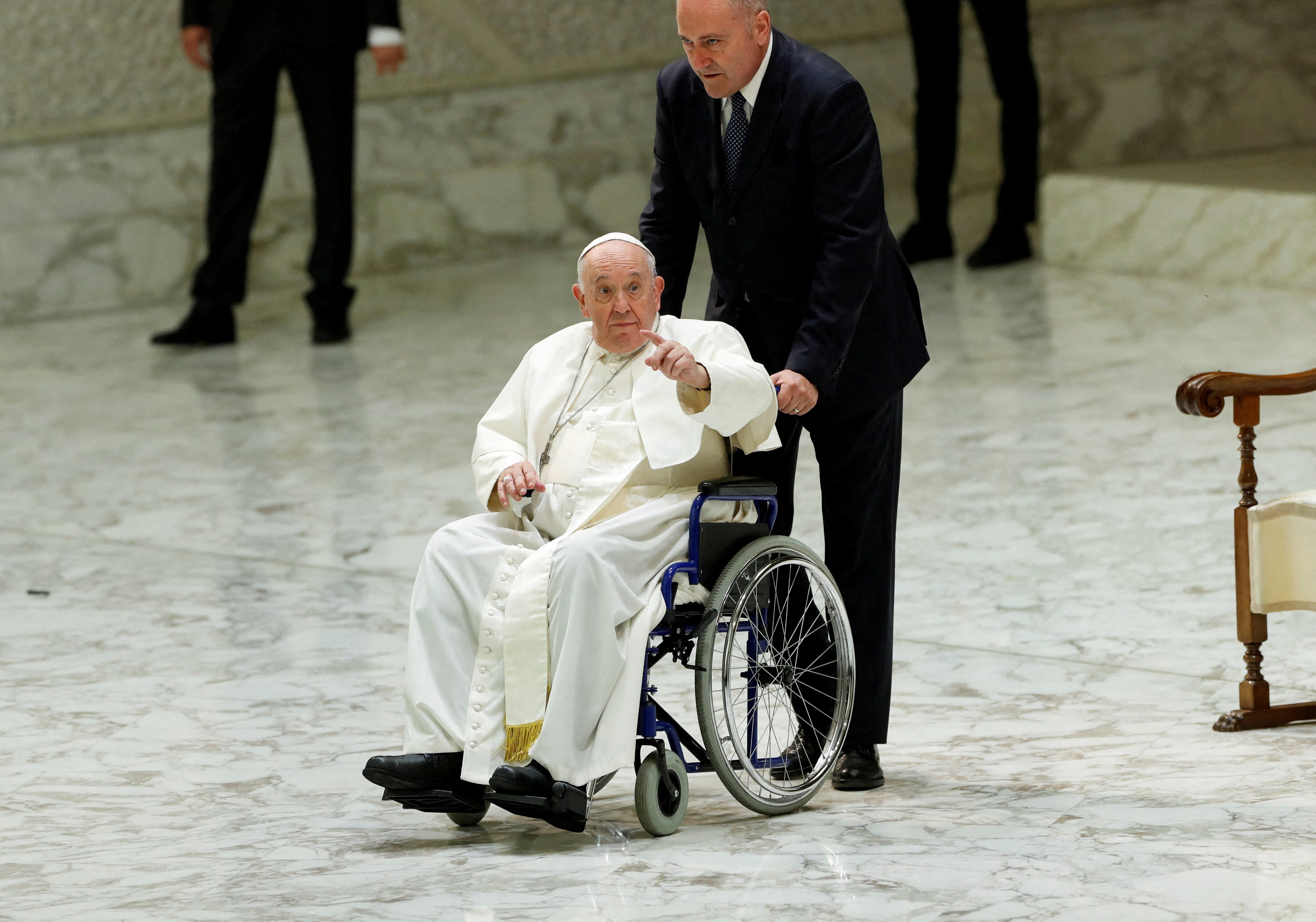 Pope Francis leaves. (REUTERS/Remo Casilli/File Photo)