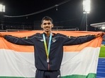 Silver medallist Murali Sreeshankar poses with the tricolor(PTI)