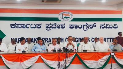 The Congress on Friday barged into the main office of the urban development department and tried to replace existing name boards with that of the BJP and Rashtriya Swayamsevak Sangh (RSS) in protest against the Basavaraj Bommai government’s ward-wise reservation for the Bruhat Bengaluru Mahanagara Palike (BBMP, the city’s civic body). (HT) The Congress on Friday barged into the main office of the urban development department and tried to replace existing name boards with that of the BJP and Rashtriya Swayamsevak Sangh (RSS) in protest against the Basavaraj Bommai government’s ward-wise reservation for the Bruhat Bengaluru Mahanagara Palike (BBMP, the city’s civic body). (HT)