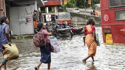 A waterlogged road after heavy rain in Kochi. (PTI) A waterlogged road after heavy rain in Kochi. (PTI)