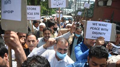 PDP workers stage a protest on the third anniversary of nullification of Article 370. (PTI)