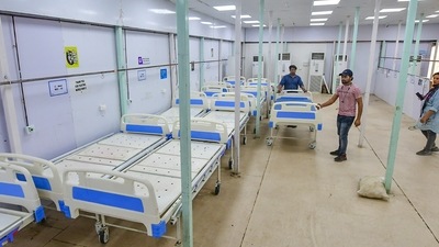 With the fresh infections on Friday, the Covid-19 case tally in the national capital rose to 19,64,793, while the death toll reached 26,327. (PTI) With the fresh infections on Friday, the Covid-19 case tally in the national capital rose to 19,64,793, while the death toll reached 26,327. (PTI)