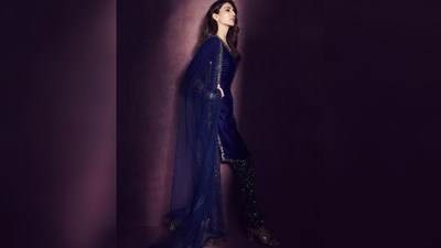 The label shared an appreciation post on Instagram with Vaani Kapoor's picture in the outfit along with another image of their in house model in the kurta set and wrote, "The charismatic Vaani Kapoor @_vaanikapoor_ adorns our Navy Blue Velvet Kurta Set from the Mahnoor Collection. (Instagram/@_vaanikapoor_) The label shared an appreciation post on Instagram with Vaani Kapoor's picture in the outfit along with another image of their in house model in the kurta set and wrote, "The charismatic Vaani Kapoor @_vaanikapoor_ adorns our Navy Blue Velvet Kurta Set from the Mahnoor Collection. (Instagram/@_vaanikapoor_)