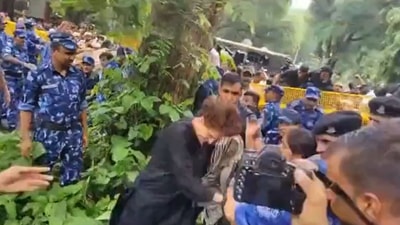Priyanka Gandhi Vadra knocked down police barricades to join protest.