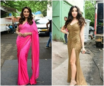 Madhuri Dixit wore a pink saree, while Nora Fatehi was dressed in a golden gown for their Jhalak Dikhhla Jaa 10 shoot in Mumbai. Madhuri Dixit wore a pink saree, while Nora Fatehi was dressed in a golden gown for their Jhalak Dikhhla Jaa 10 shoot in Mumbai.