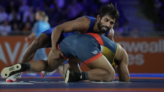 India's Bajrang, (top) (AP)