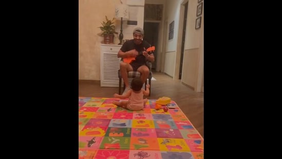 The image, taken from the Instagram video, shows Aparshakti Khurana singing for his daughter.(Instagram/@aparshakti_khurana)
