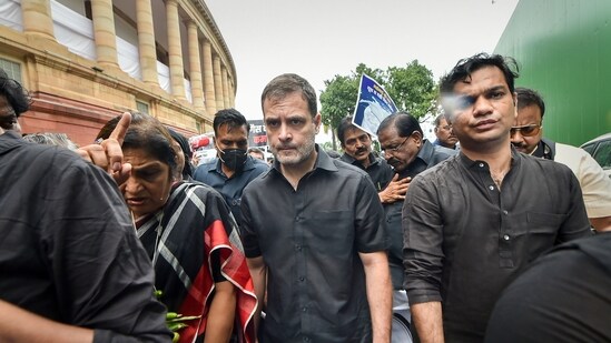 New Delhi: Congress leader Rahul Gandhi, wearing black clothes, along with party MPs marches towards Rashtrapati Bhawan as part of party's nationwide protest over price rise, unemployment and GST hike on essential items, in New Delhi, Friday,
