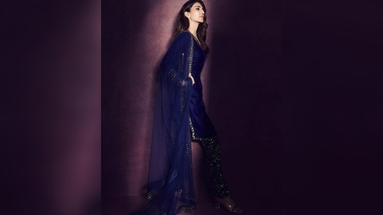 The label shared an appreciation post on Instagram with Vaani Kapoor's picture in the outfit along with another image of their in house model in the kurta set and wrote, "The charismatic Vaani Kapoor @_vaanikapoor_ adorns our Navy Blue Velvet Kurta Set from the Mahnoor Collection.(Instagram/@_vaanikapoor_)