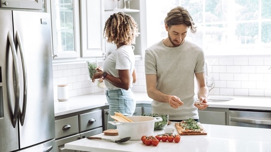 Do things that you both like doing together: Go for a movie or call them over and bake or cook something and talk out the differences.(Unsplash)