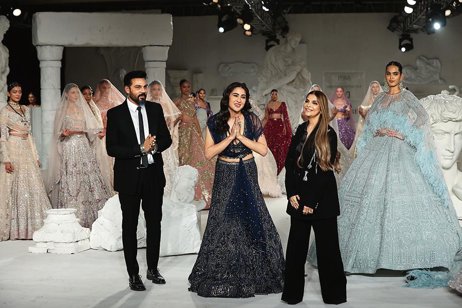 Designer-duo Falguni and Shane Peacock with actor Sara Ali Khan Designer-duo Falguni and Shane Peacock with actor Sara Ali Khan