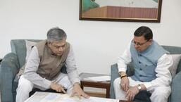 Chief minister Pushkar Singh Dhami during a meeting with Union minister for railways, communications, electronics and information technology Ashwini Vaishnaw , in New Delhi on Saturday. (HT Photo)