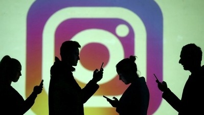 Some photographers have criticized Instagram's TikTok-like redesign. (REUTERS)