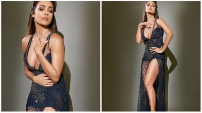 The designer duo Rohit Gandhi and Rahul Khanna recently made their couture debut with their latest collection 'Fibonacci' at the ongoing FDCI India Couture Week 2022 that witnessed some of the finest couturiers in India. The stunning Malaika Arora played muse for the designer duo and walked the ramp in a black sheer gown. (Instagram/@malaikaaroraofficial) The designer duo Rohit Gandhi and Rahul Khanna recently made their couture debut with their latest collection 'Fibonacci' at the ongoing FDCI India Couture Week 2022 that witnessed some of the finest couturiers in India. The stunning Malaika Arora played muse for the designer duo and walked the ramp in a black sheer gown. (Instagram/@malaikaaroraofficial)
