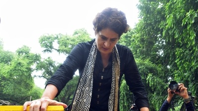Congress leader Priyanka Gandhi Vadra jumps over a police barricade placed near AICC HQ during the party's nationwide protest over price rise and unemployment. (ANI) Congress leader Priyanka Gandhi Vadra jumps over a police barricade placed near AICC HQ during the party's nationwide protest over price rise and unemployment. (ANI)