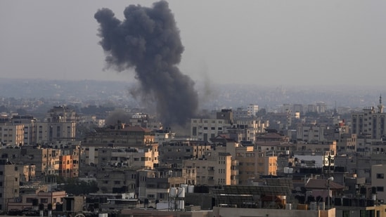 Smoke rises after Israeli airstrikes on residential building in Gaza, Saturday, August 6, 2022. (AP Photo/Adel Hana)