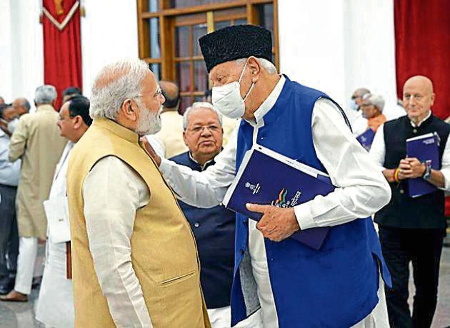Prime Minister Narendra Modi interacts with Jammu and Kashmir National Conference (JKNC) chief Farooq Abdullah at the third meeting of the National Committee of Azadi Ka Amrit Mahotsav, at Rashtrapati Bhavan Cultural Centre, in New Delhi on Saturday. (ANI Photo/ANI Pic Service) Prime Minister Narendra Modi interacts with Jammu and Kashmir National Conference (JKNC) chief Farooq Abdullah at the third meeting of the National Committee of Azadi Ka Amrit Mahotsav, at Rashtrapati Bhavan Cultural Centre, in New Delhi on Saturday. (ANI Photo/ANI Pic Service)