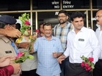 Delhi chief minister Arvind Kejriwal receives a warm welcome upon his arrival at Jamnagar airport on Saturday. (ANI) Delhi chief minister Arvind Kejriwal receives a warm welcome upon his arrival at Jamnagar airport on Saturday. (ANI)