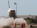 An Israeli Iron Dome air defence system launches a missile to intercept rockets fired from the Gaza Strip, on the outskirts of the southern Israeli city of Ashkelon.(AFP) An Israeli Iron Dome air defence system launches a missile to intercept rockets fired from the Gaza Strip, on the outskirts of the southern Israeli city of Ashkelon.(AFP)